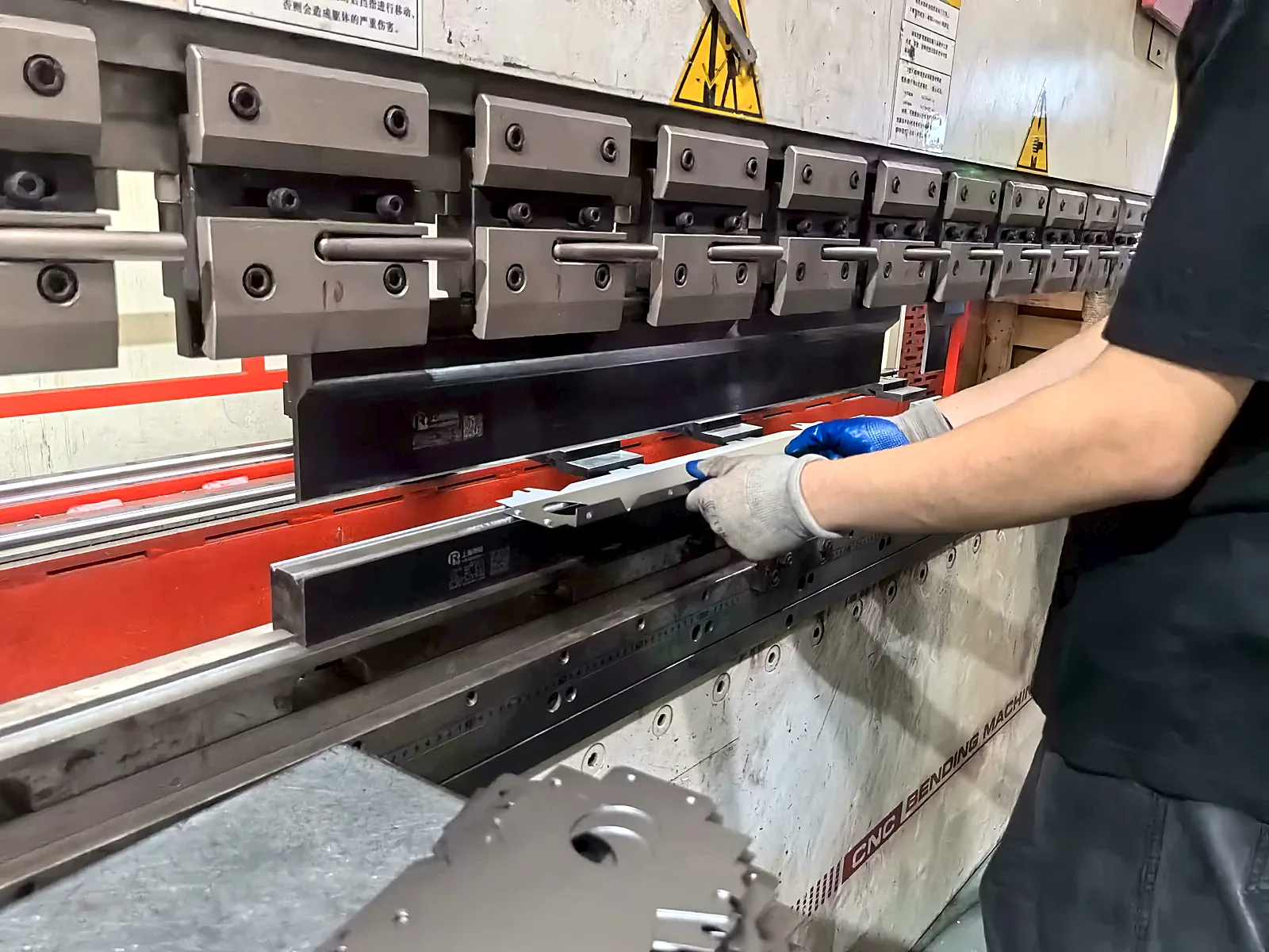 CNC press brake bending a sheet metal trolley panel