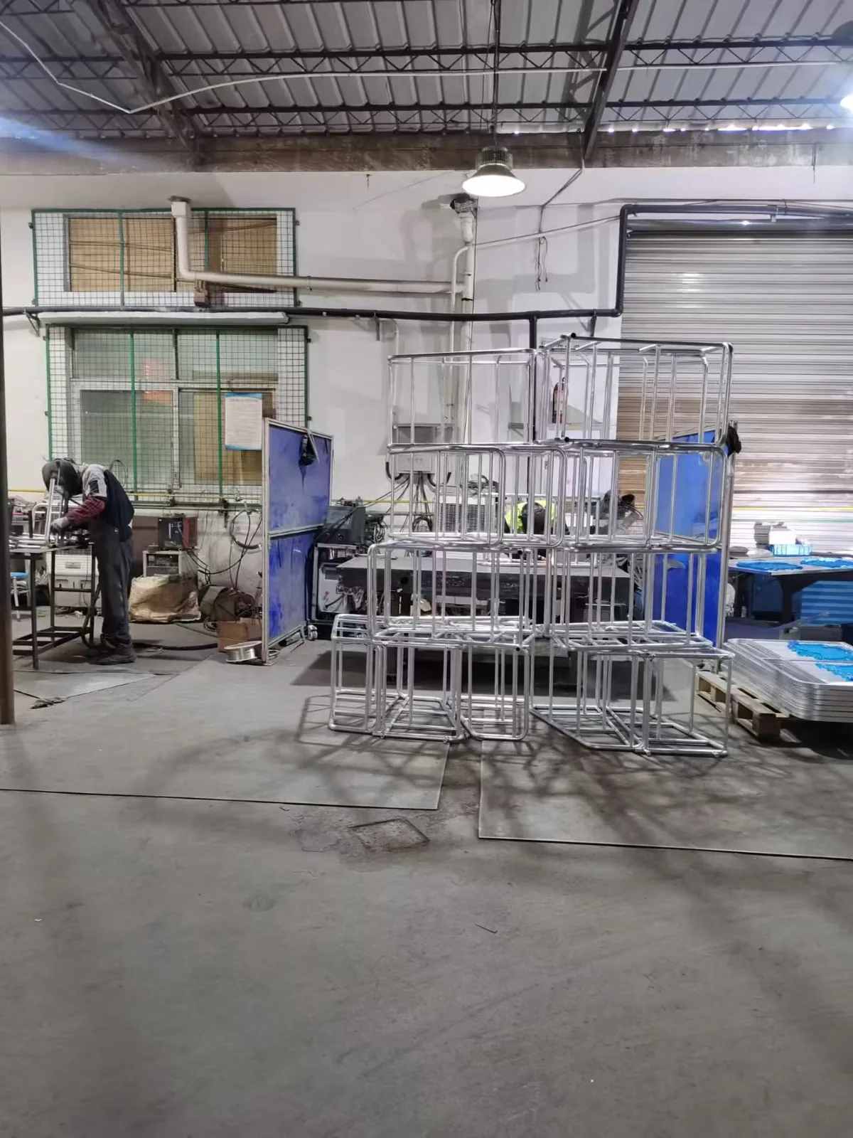 Raw material storage racks holding tube and sheet stock