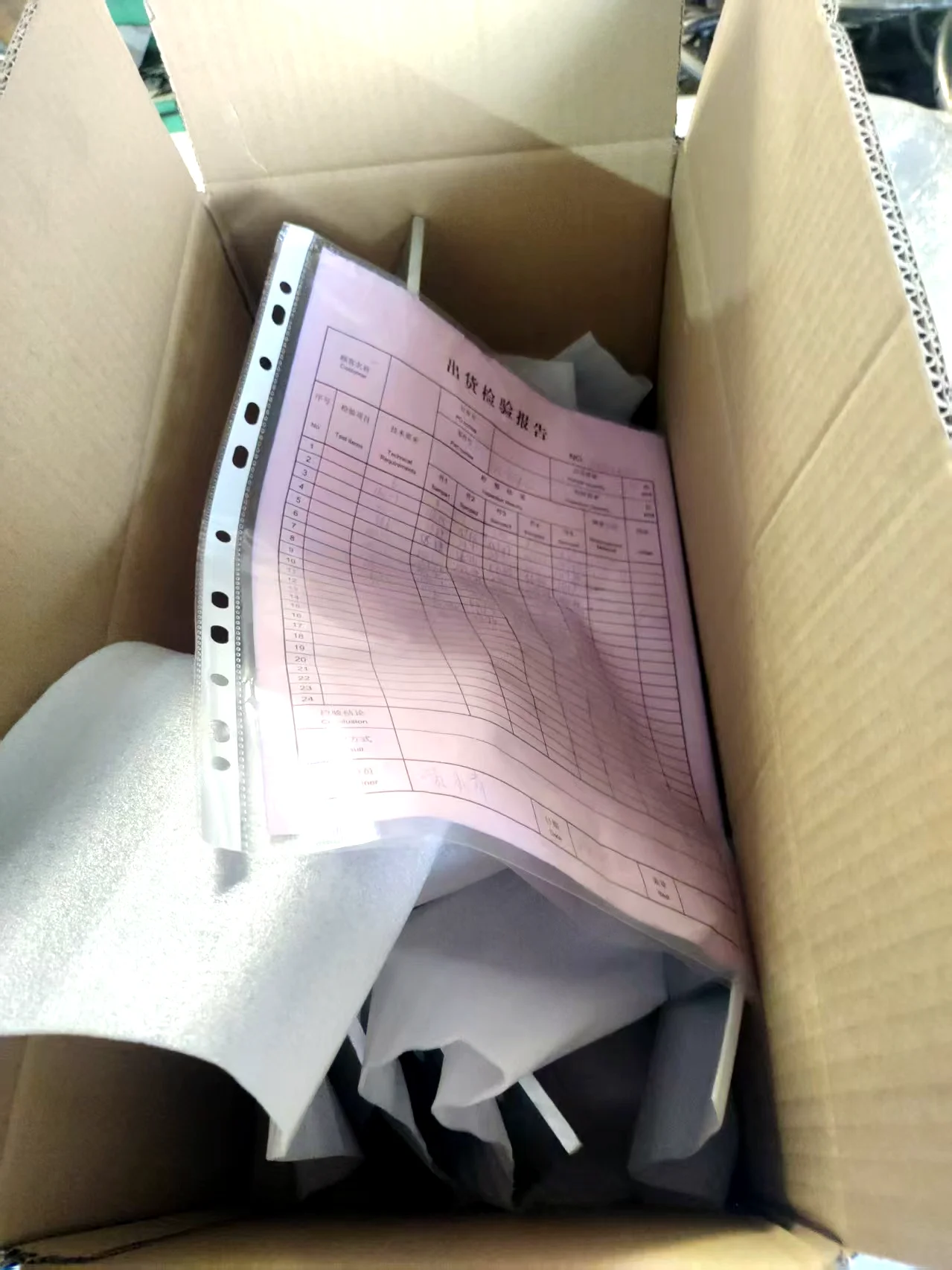 Outgoing inspection report being prepared for a trolley shipment
