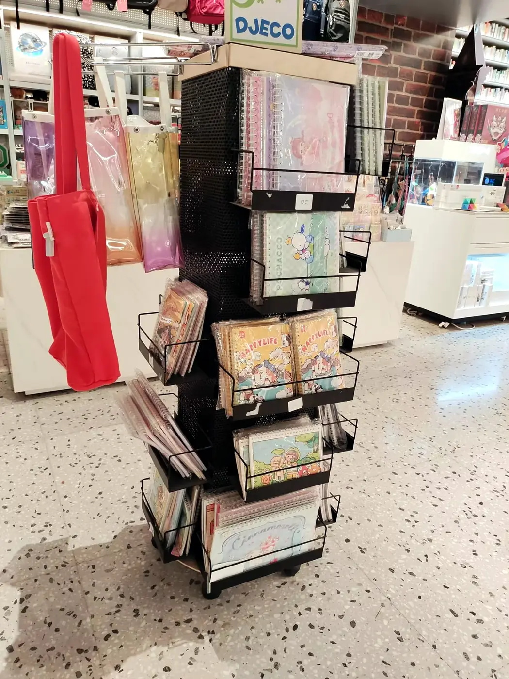 Bookstore display trolley with rotating wire baskets