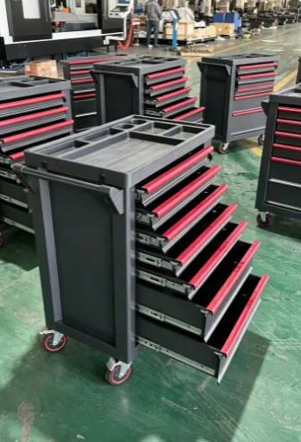 Batch of grey drawer units fitted to mobile workshop cabinets