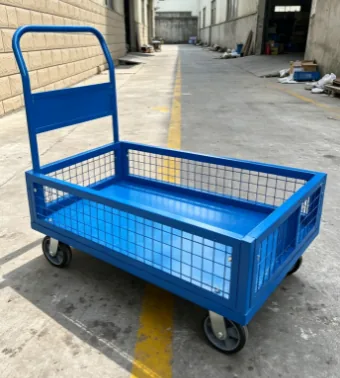 Blue mesh-side picking trolley angled view in the factory yard
