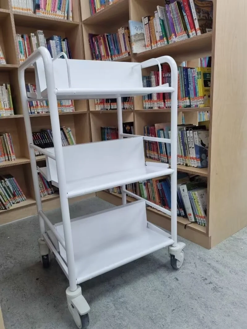Custom white library book trolley with steel tube frame and three aluminium shelves, in use at a Korean library