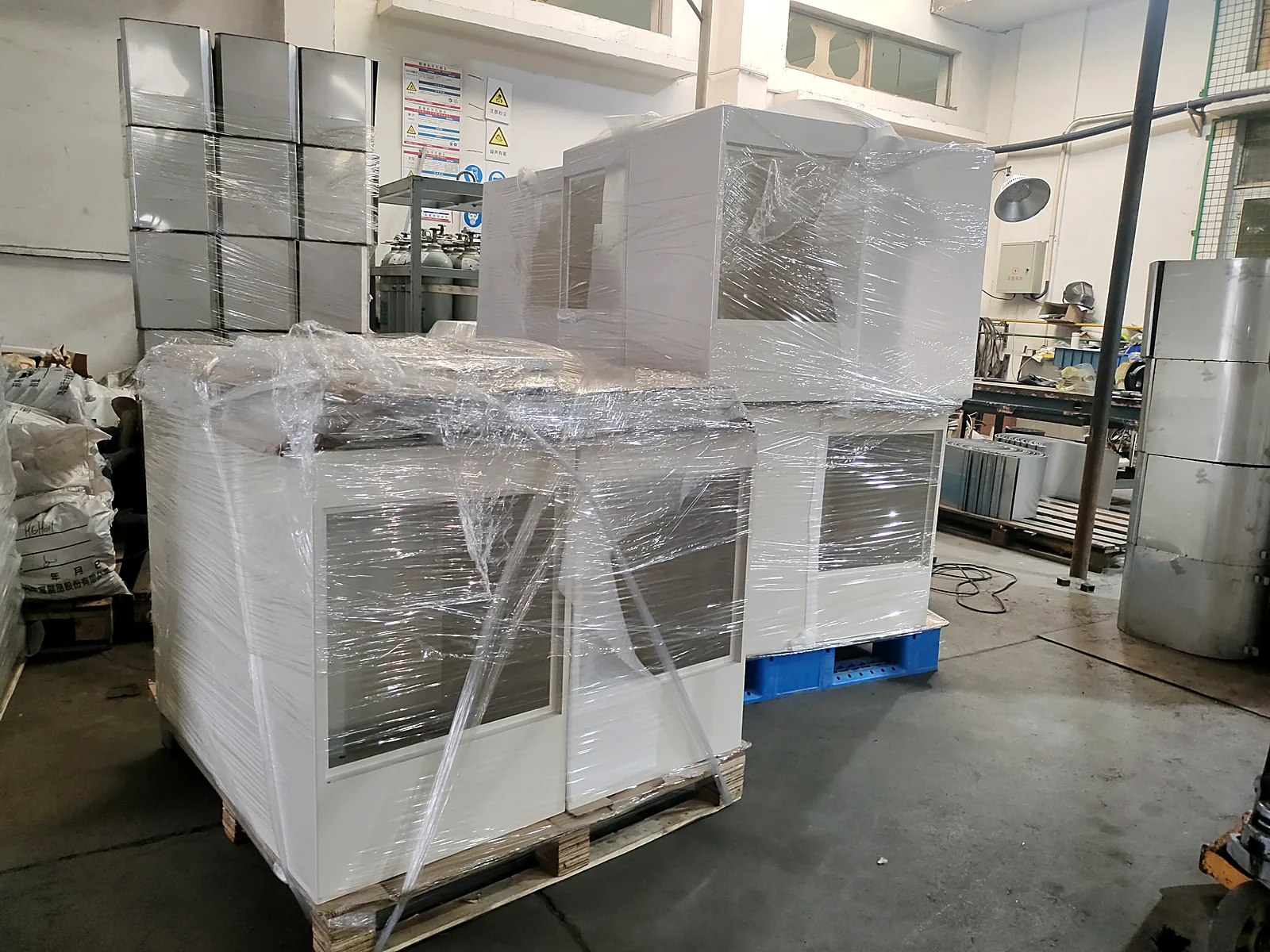 Powder coating line finishing trolley frames and panels in white